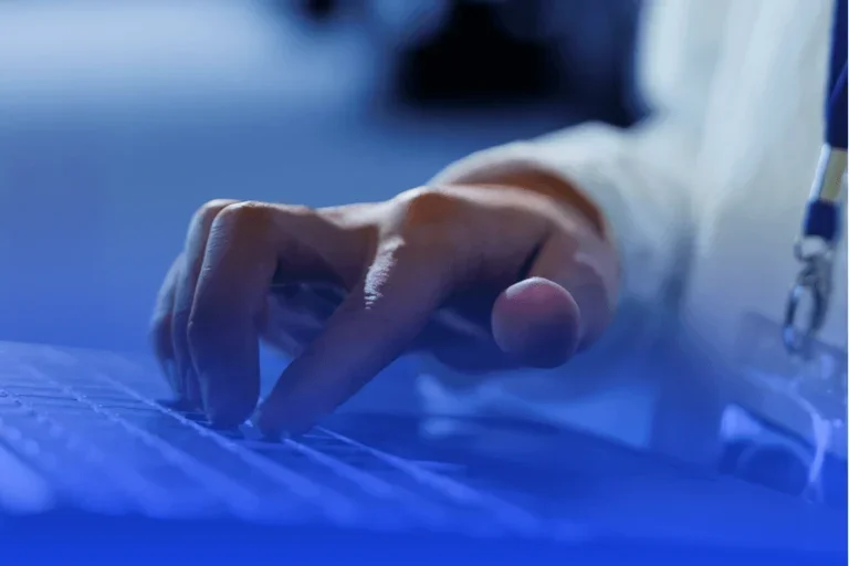 fingers at keyboard